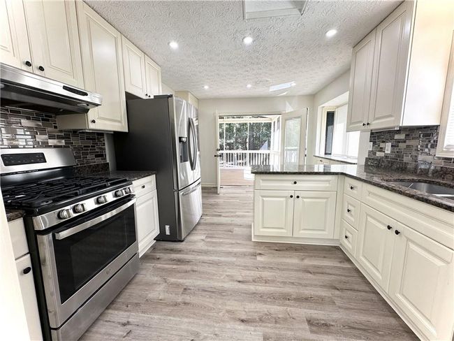 3559 Sawmill Ter, House other with 4 bedrooms, 3 bathrooms and null parking in Marietta GA | Image 5