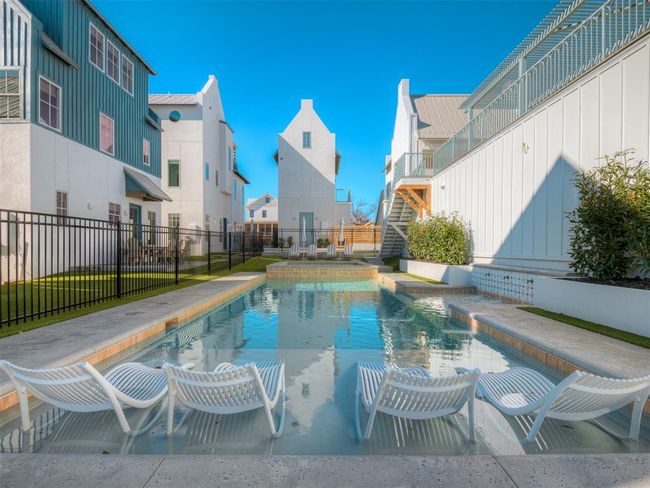 View of pool featuring a residential view | Image 42