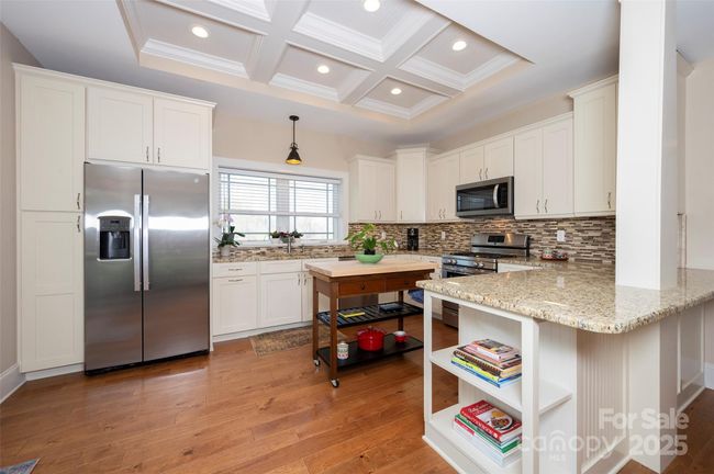 Basement Apartment features Stainless Steel Appliances including Side-by-Side Refrigerator/Freezer, Dishwasher, Gas Range/Oven, Granite Countertops, Coffered Ceiling | Image 37