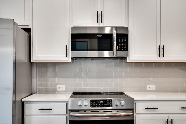 Absolutely love the tiled backsplash. | Image 14