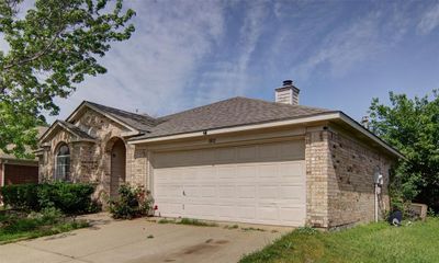 Single story home with a garage | Image 2