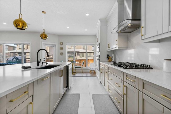 316 Kinniburgh Link, House other with 5 bedrooms, 4 bathrooms and 6 parking in Chestermere AB | Image 19
