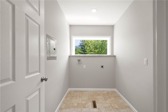 Spacious laundry room conveniently located on the 2nd floor. | Image 39