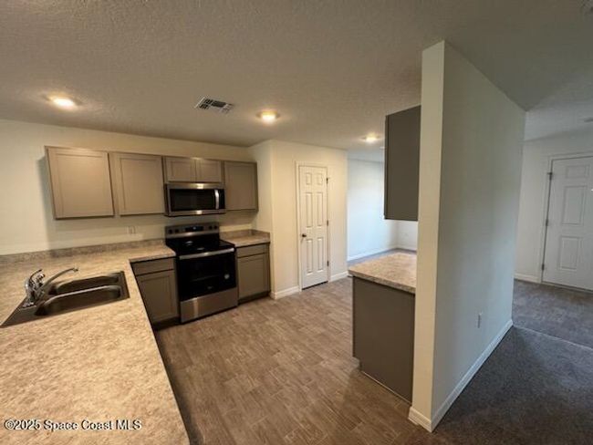 2683 Palomar Ave Se, House other with 3 bedrooms, 2 bathrooms and null parking in Palm Bay FL | Image 4