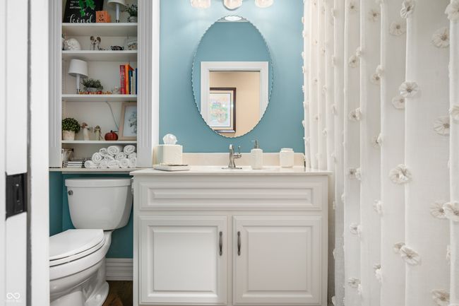 bathroom with toilet and vanity | Image 38