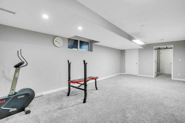 1240 Kings Heights Rd Se, House other with 4 bedrooms, 5 bathrooms and 4 parking in Airdrie AB | Image 21