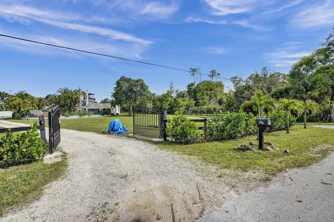 502 Rambling Drive Cir, House other with 5 bedrooms, 3 bathrooms and null parking in Wellington FL | Image 89