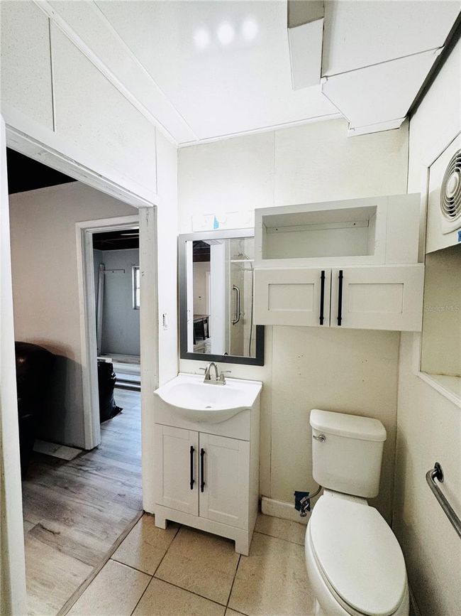 bathroom at front of the gouse off the living room and bedroom | Image 36