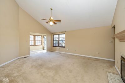 Vaulted Great room. Straight ahead is the sun room area that leads to the back deck | Image 2