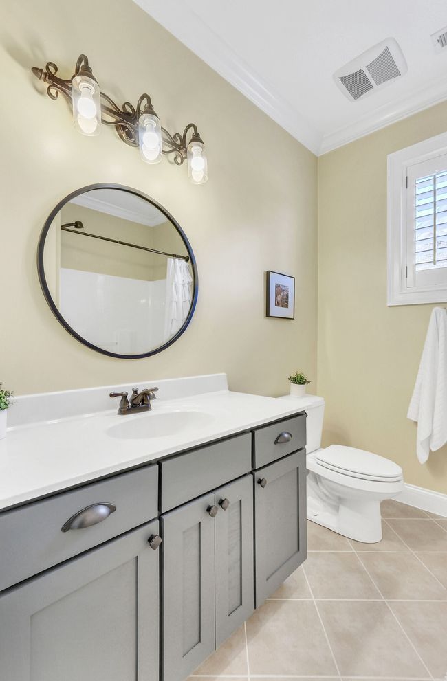 Large vanity and pretty tiled floors. | Image 43
