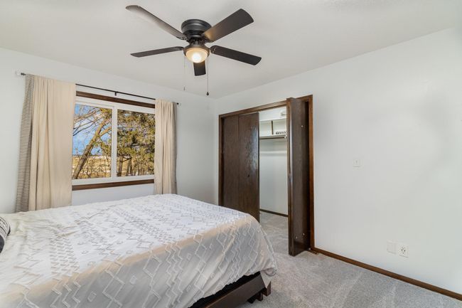 1 of 5 bedrooms on main level, all are large with good closet space. | Image 13