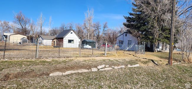 View of yard featuring fence | Image 27