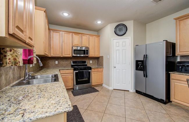 21522 Amesbury Meadow Ln, House other with 5 bedrooms, 3 bathrooms and 2 parking in Spring TX | Image 25