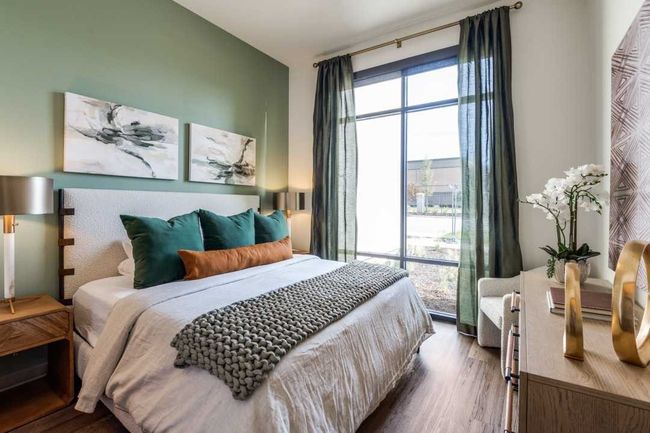 Bedroom featuring dark hardwood / wood-style flooring | Image 8