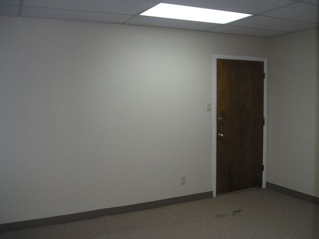 Corridor featuring a paneled ceiling and baseboards | Image 11