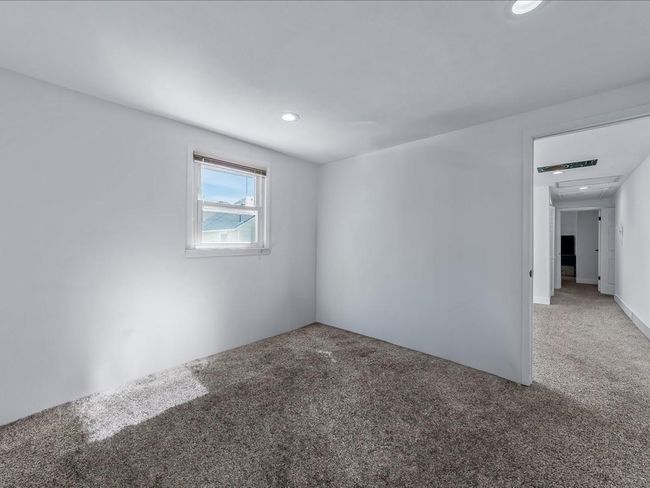 Unfurnished room with carpet flooring and recessed lighting | Image 27