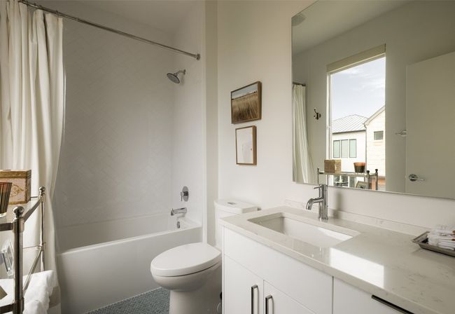 Full bath featuring vanity and shower / bathtub combination with curtain | Image 33