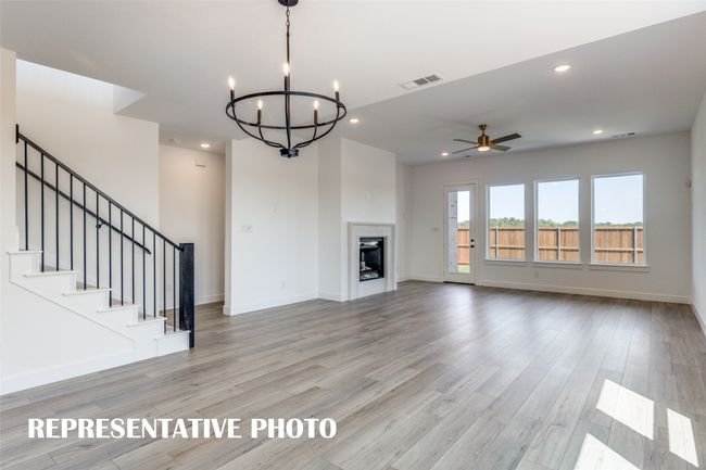 Sophisticated and full of style, this living-dining area is everything you have been searching for in a new home! REPRESENTATIVE PHOTO | Image 9