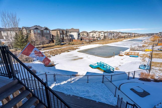 24 Bayside Link Sw, Home with 4 bedrooms, 3 bathrooms and 5 parking in Airdrie AB | Image 40