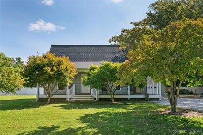 View of front of house featuring a front lawn | Image 2