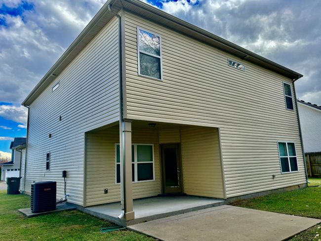 The back patio is covered and has room to sit and enjoy your morning coffee | Image 17