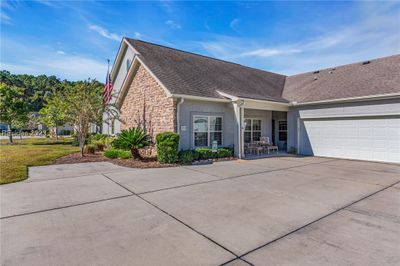 1715 Abbey Glen Way is a 3BR, 2.5BA Oconee Model Condominium that features 2, 131 sq ft of superb living space all on one level and an oversized two car garage with room for work shop and golf cart. | Image 3