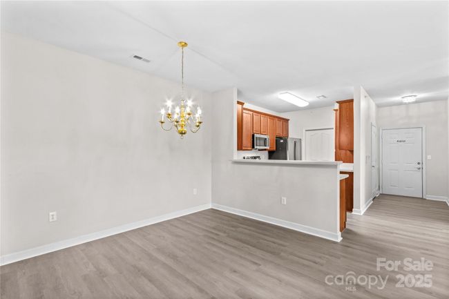 Dining Room overlooking kitchen and entry | Image 18