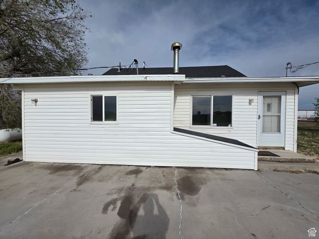Back of house with a patio | Image 4