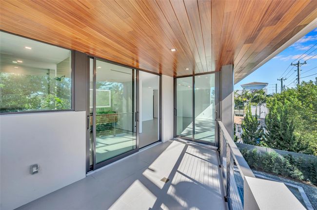 Private Rear-Facing Balcony that extends from Primary Bedroom and Spa Bath | Image 42