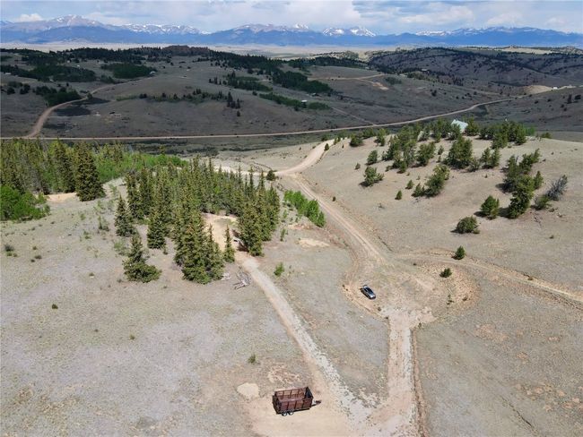 Aerial view of property's location with mountains and rural landscape | Image 20