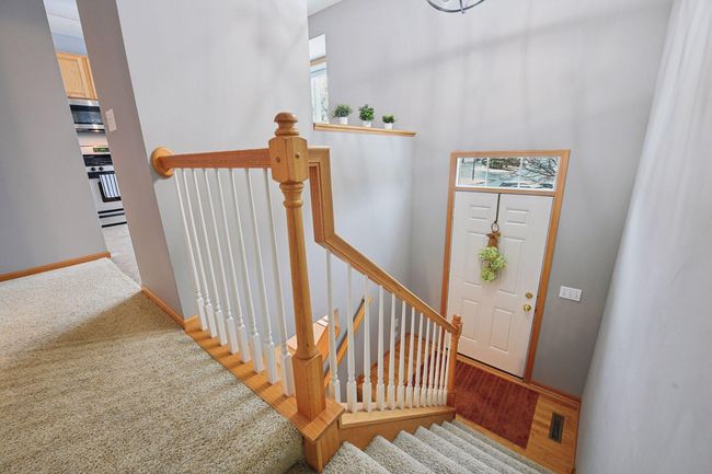 Main Foyer to lower level Family Room. | Image 34