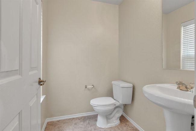 Main floor half bathroom making hosting guests a breeze | Image 8