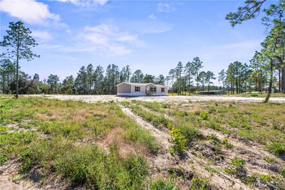 13090 Se 21 Place, House other with 3 bedrooms, 2 bathrooms and null parking in Morriston FL | Image 3