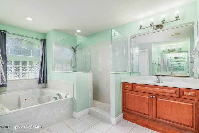 Primary Bathroom with his and her closets | Image 21