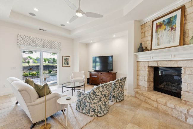 Light, bright and airy living room with gorgeous stone gas fire place | Image 4