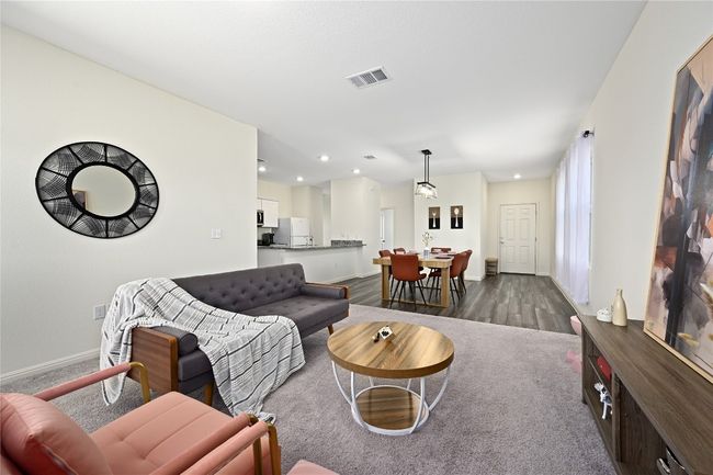 Living room featuring recessed lighting, dark wood finished floors, visible vents, and baseboards | Image 16