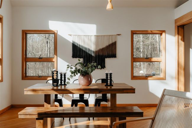 Dining area with light hardwood / wood-style floors | Image 10
