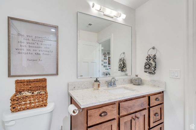 Bathroom with vanity and toilet | Image 50