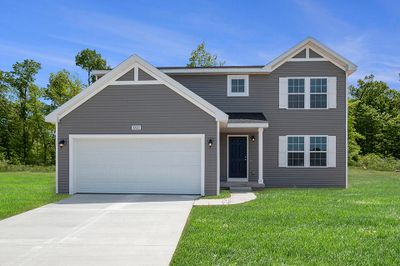 This traditional 2 story home features 4 bedrooms plus a den, 2.5 baths and upgraded finishes throughout. Totals living space is 2, 062 sq ft. | Image 1