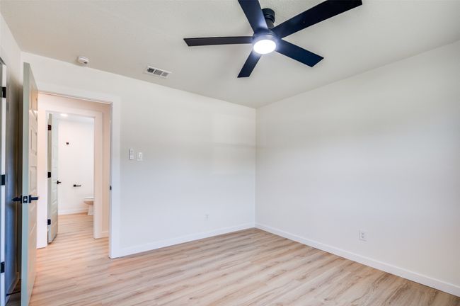Spare room with recessed lighting, a ceiling fan, and light wood-type flooring | Image 15