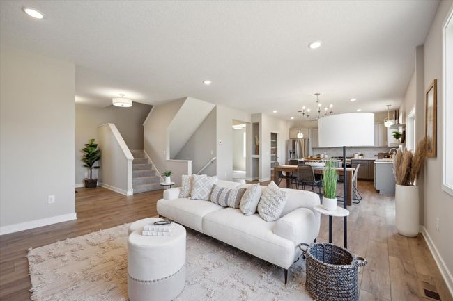 Family room with large windows. This is not the actual home for sale, but photos of the same floorplan. Additional options may be shown. | Image 5