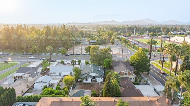 Bird’s-eye views show lot depth, neighborhood proximity, and scale of both main and guest structures. | Image 61