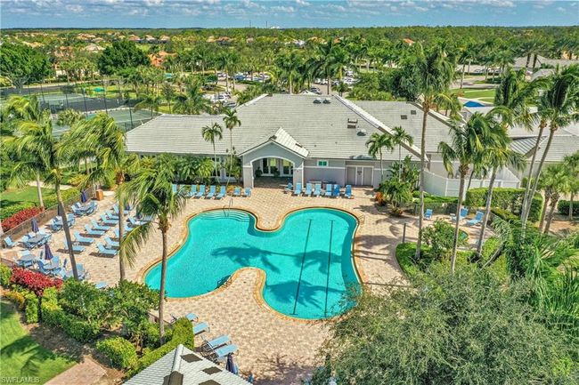 View of swimming pool with a patio area | Image 22