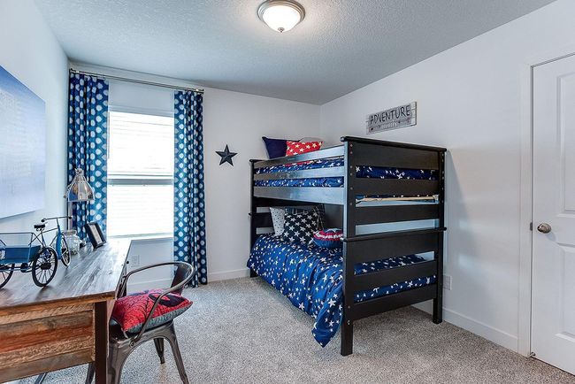 Spacious bedroom #2. Photo is of model home. Colors and options may vary. Ask Sales Agent for details. | Image 28