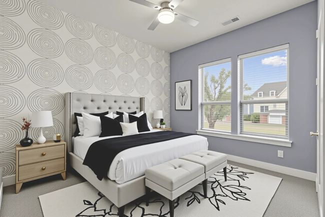 Virtually staged Bedroom with baseboards, light carpet, and a ceiling fan | Image 25