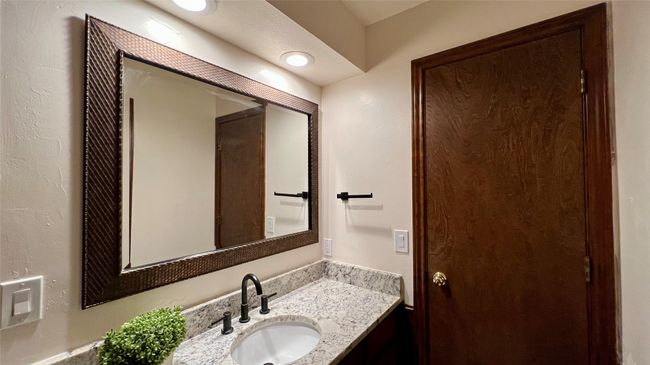 Bathroom featuring vanity | Image 13