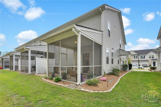 Lovely screened in porch. | Image 8
