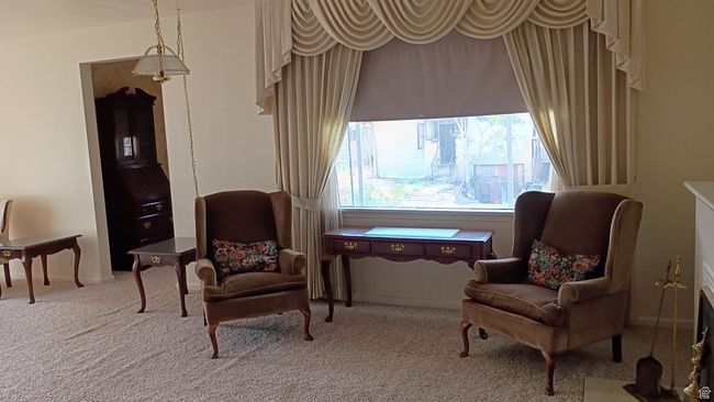 Sitting room featuring carpet floors | Image 6