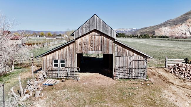 View of barn with a rural view and a mountain view | Image 29