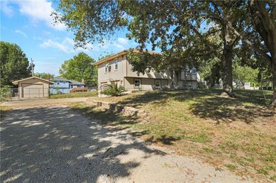 View of front facade with a front yard | Image 2